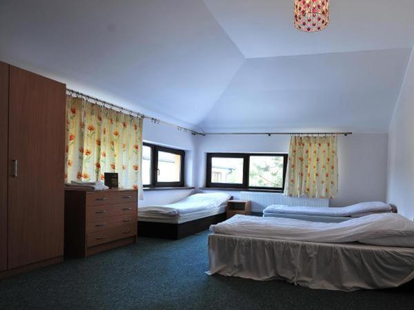 Hotel Arkadia客房内的一张或多张床位