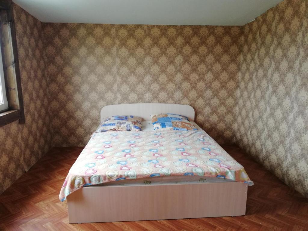 Guest House Dudeevykh客房内的一张或多张床位