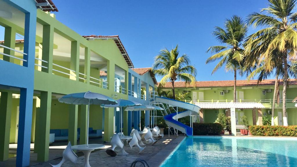阿拉卡茹帕克达斯阿瓜酒店的一个带游泳池的度假酒店
