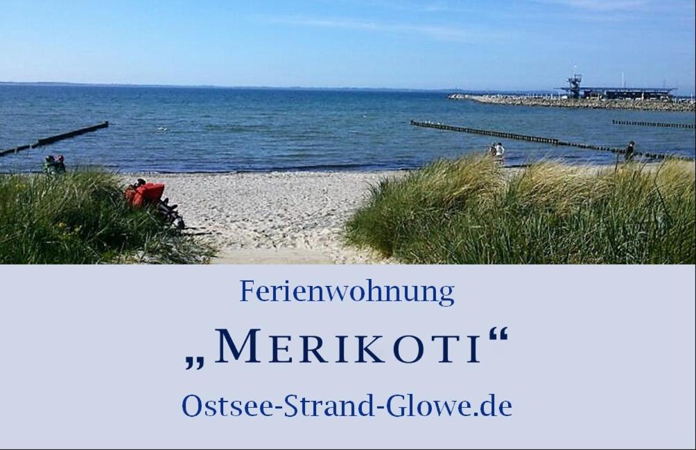 格洛韦Merikoti的一张海滩图片,上面写着铁霉素的默鲁特语