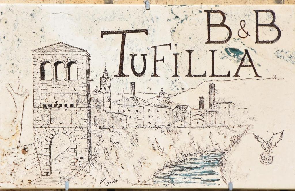 阿斯科利皮切诺B&B Tufilla的城市画画,带有"britilia"字样