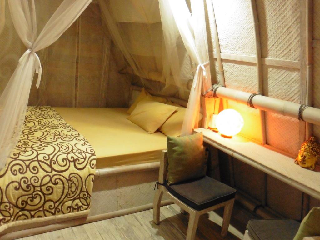 乌布乌玛南迪自然小屋客房内的一张或多张床位