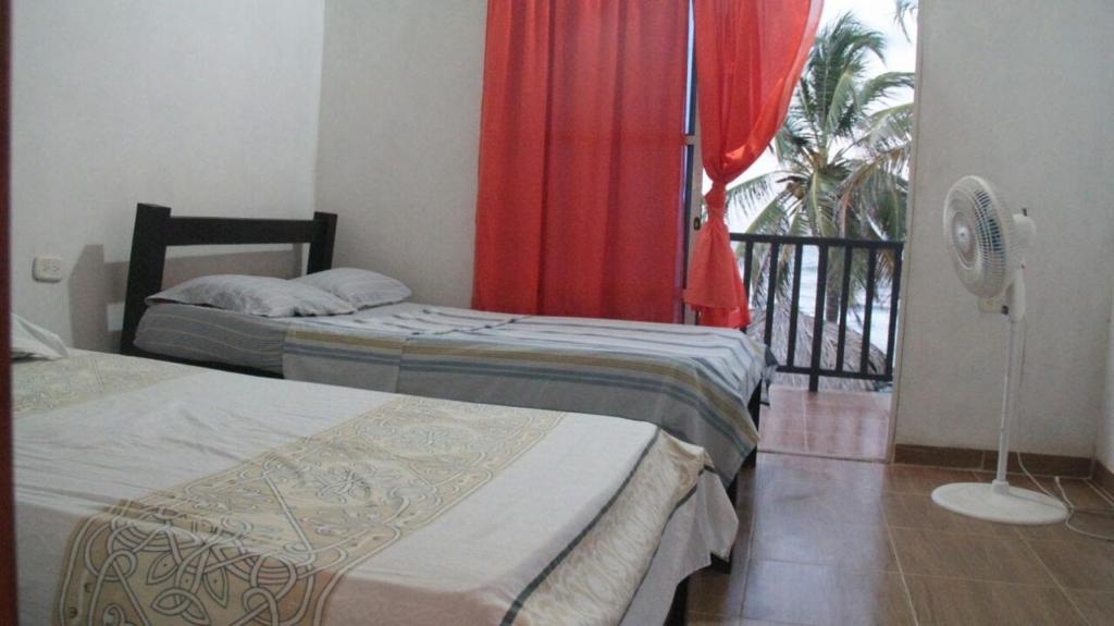 Tadù Playa Hotel客房内的一张或多张床位