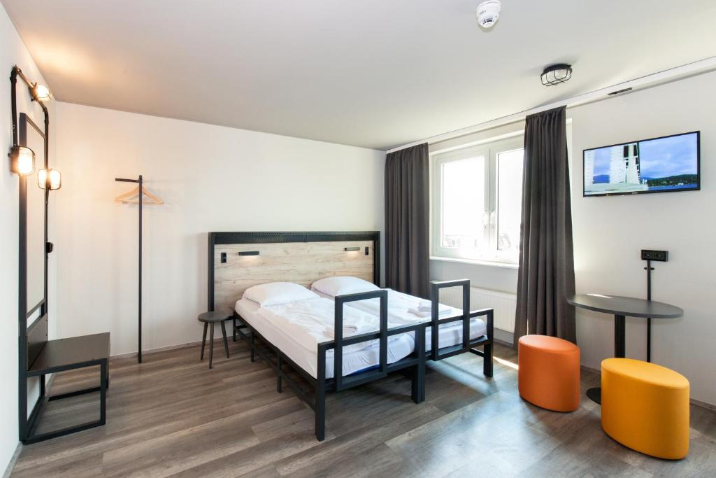 a＆o柏林米特酒店客房内的一张或多张床位