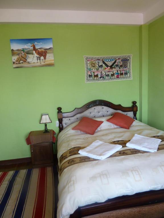 Hostal Puerto Yumani客房内的一张或多张床位