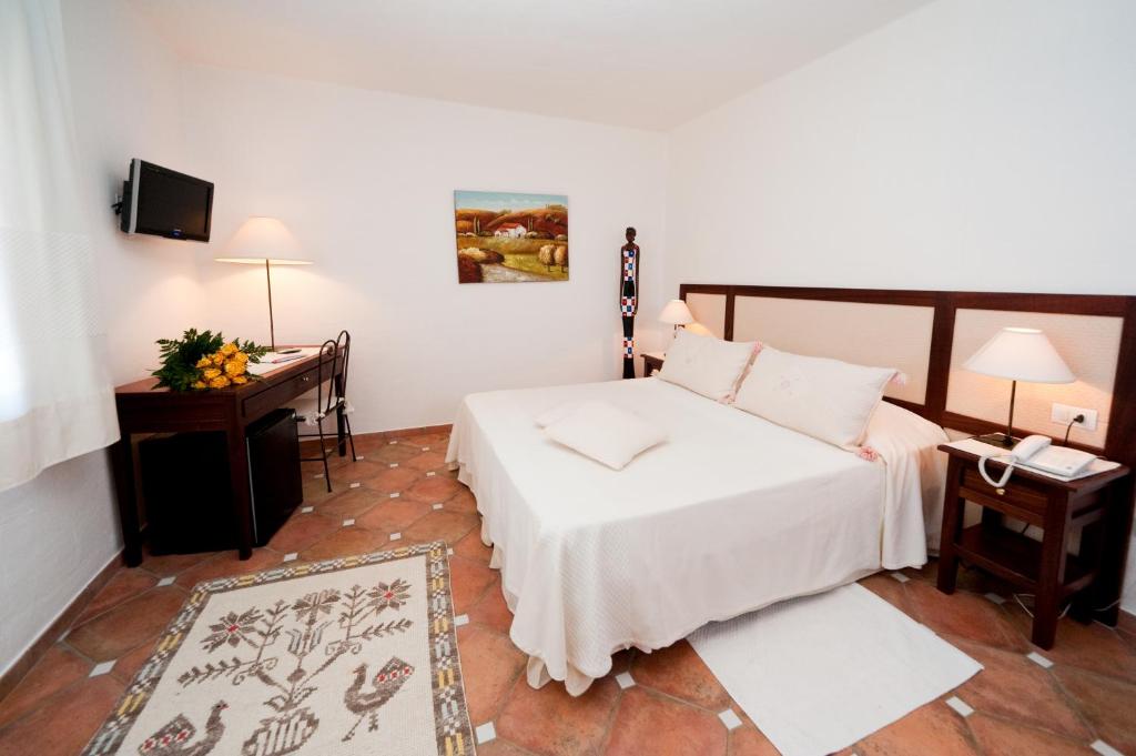 S'Arenada Hotel - Adults Only客房内的一张或多张床位