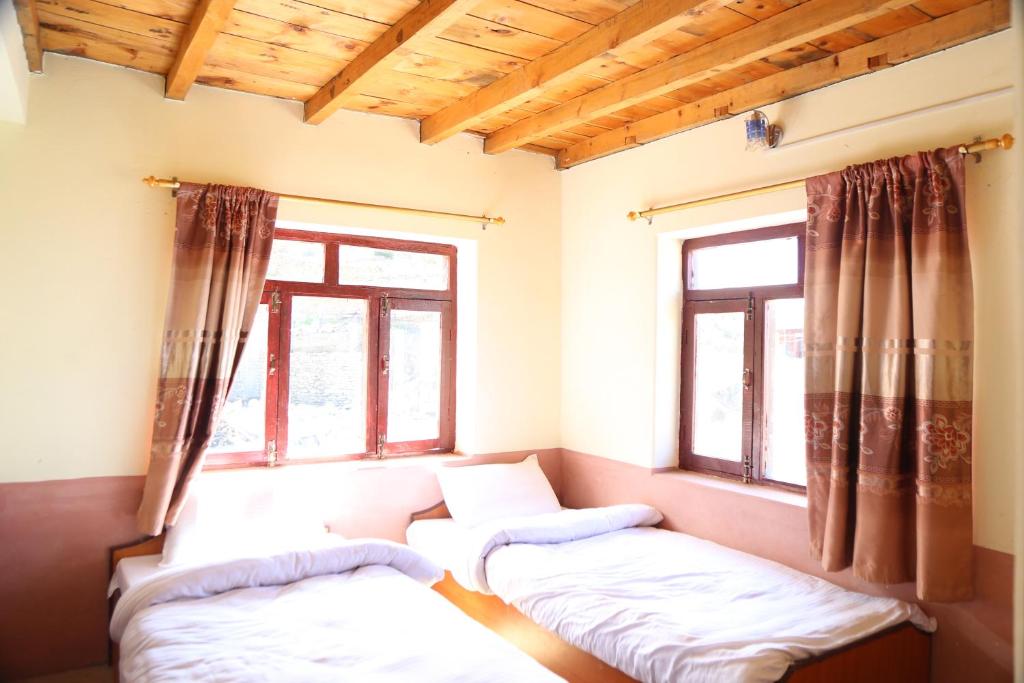 Himalayan Paradise客房内的一张或多张床位