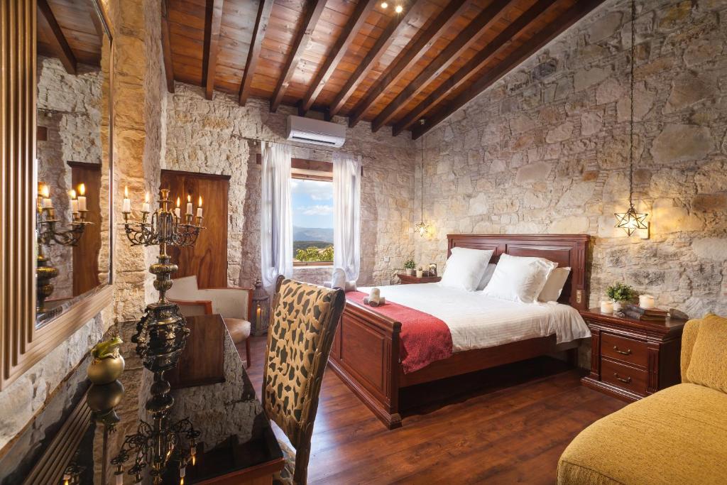 欧奴萨传统精品宾馆客房内的一张或多张床位
