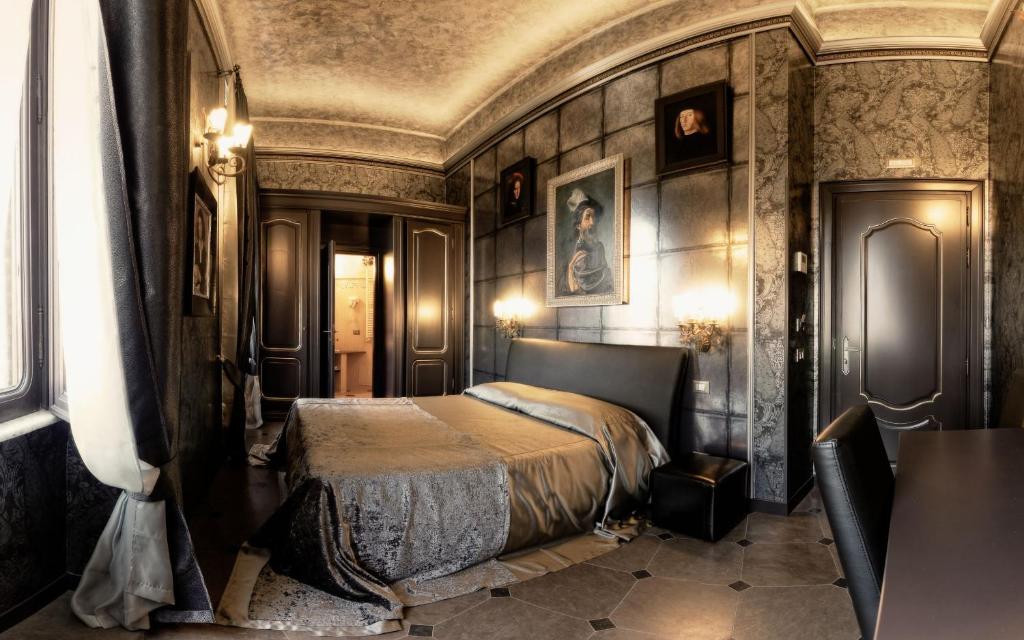 罗马昂缇卡迪莫拉德拉五弓形酒店的卧室配有一张床