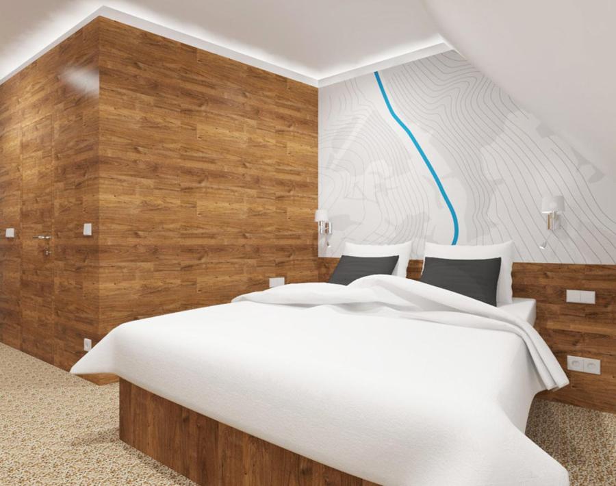 弗尔赫拉比Hotel Albis的卧室设有一张白色大床和木墙