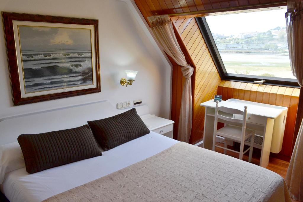 Hotel Alda Santa Cristina客房内的一张或多张床位