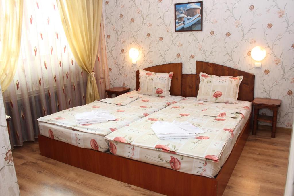 Hotel Trakia客房内的一张或多张床位
