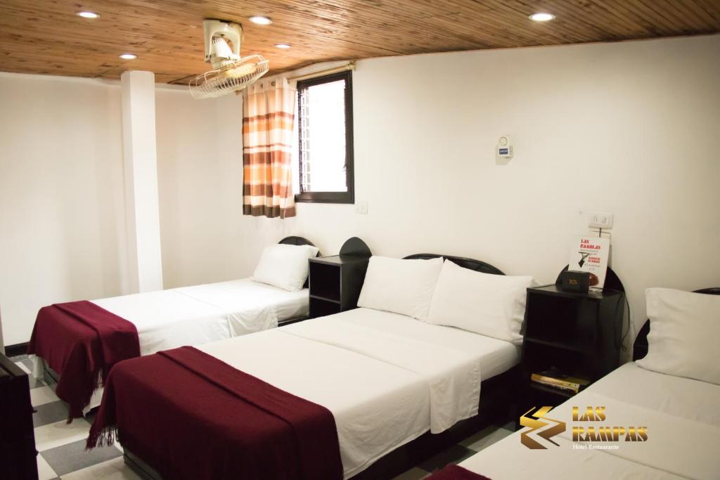 Hotel Las Rampas客房内的一张或多张床位