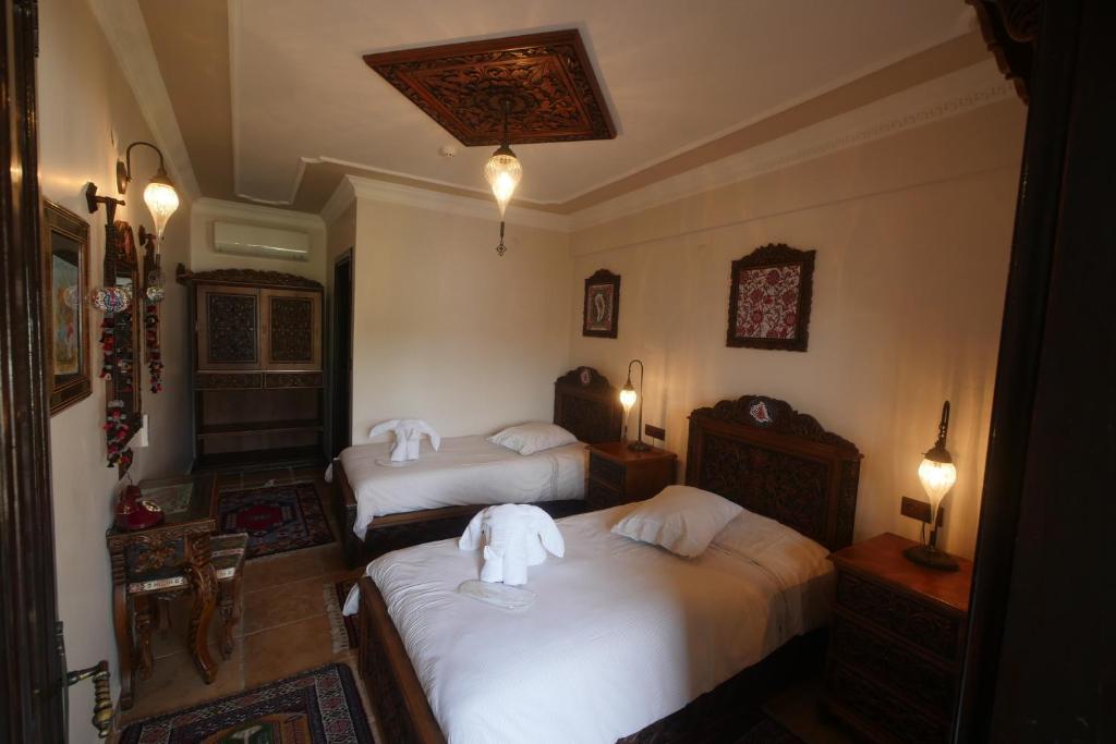 尼尔雅酒店客房内的一张或多张床位