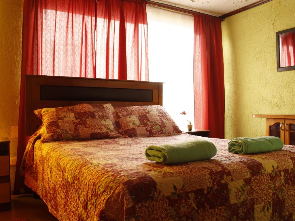 Hostal Inthalassa Caldera客房内的一张或多张床位