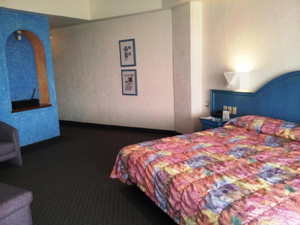 茵苏尔酒店客房内的一张或多张床位
