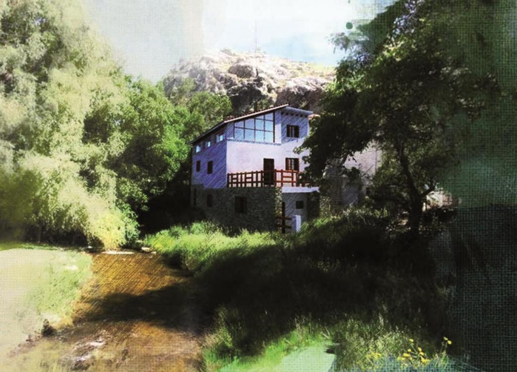 蓬托内斯Casas Rurales El Nacimiento的河岸房屋的画