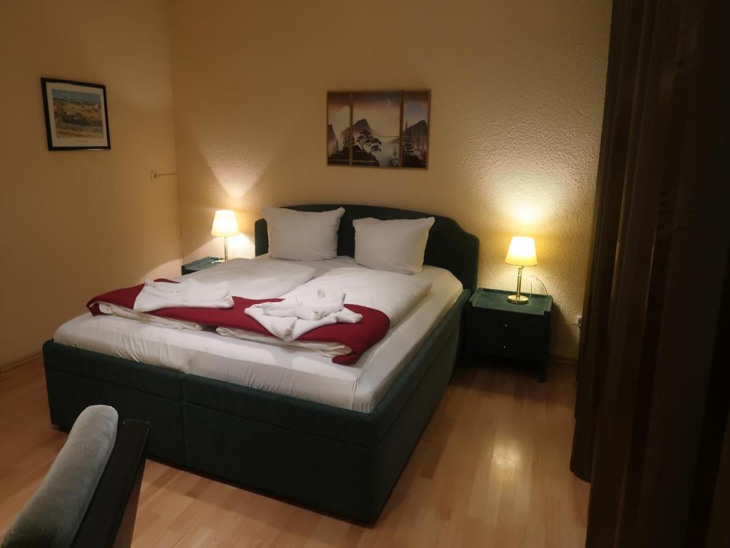 莱比锡阿尔德酒店客房内的一张或多张床位