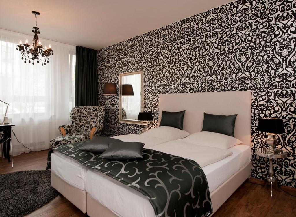 Arthotel ANA Residence Bremen客房内的一张或多张床位