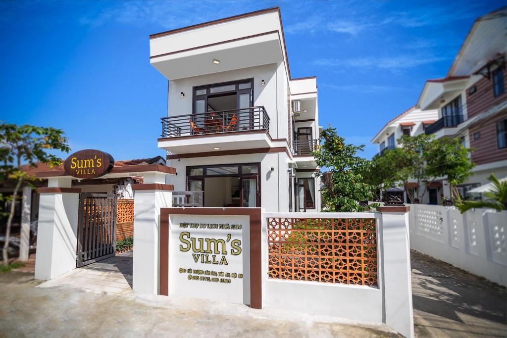 An Bàn (2)Sum villa Hoi An的前面有标志的白色房子