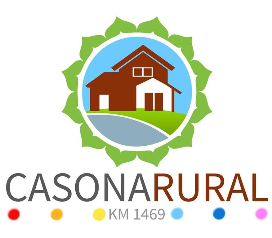 里科港Casona Rural Km 1469的房屋房地产公司的标志