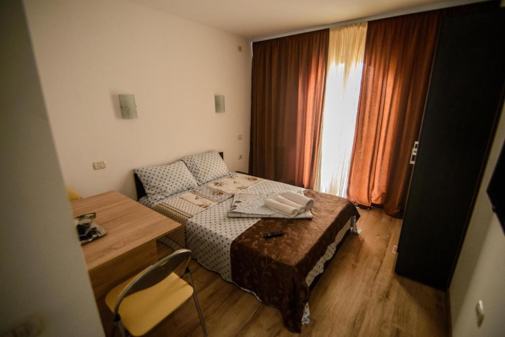 Vila Onasis客房内的一张或多张床位