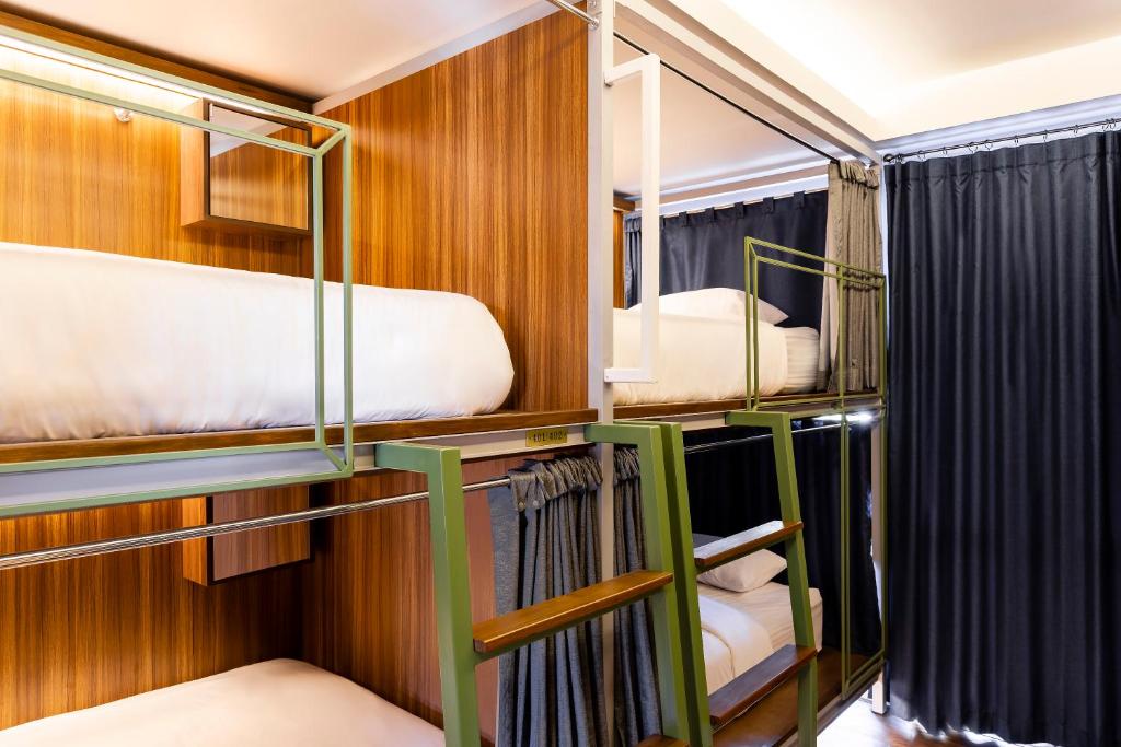 Khunluang Hostel客房内的一张或多张床位