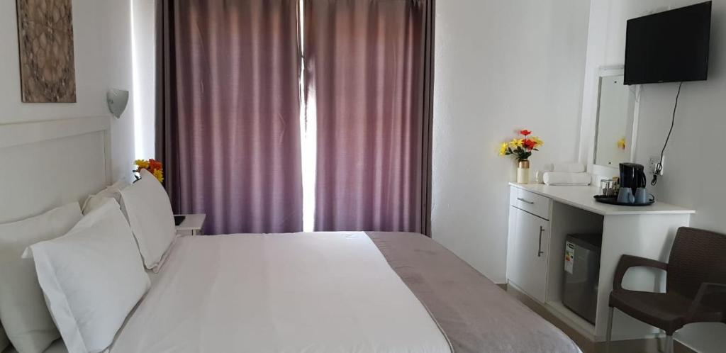 Royal Ushaka Durban North客房内的一张或多张床位
