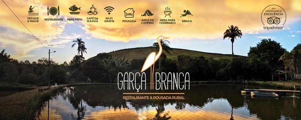 圣罗克迪米纳斯Garça Branca的鸟儿站在池塘里的海报