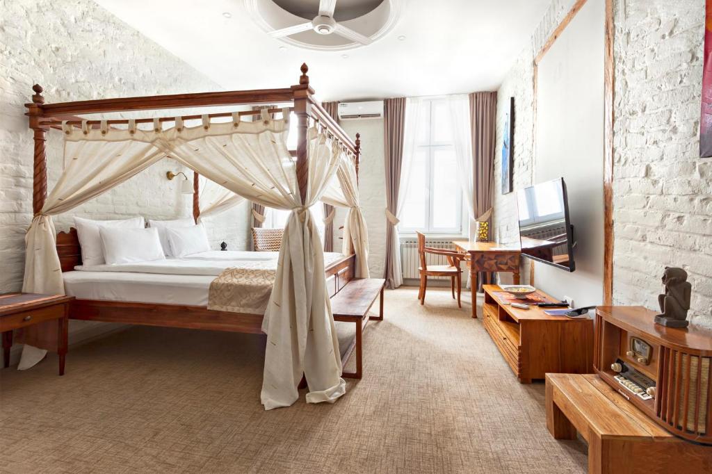 SuperB Luxury Suites客房内的一张或多张床位