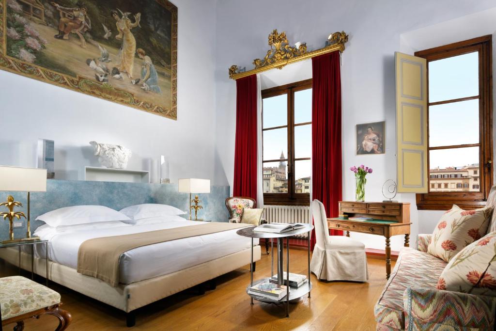 Leone Blu Suites | UNA Esperienze客房内的一张或多张床位