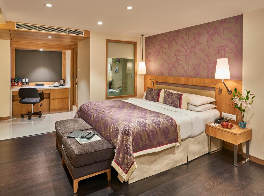 巴瓦国际酒店客房内的一张或多张床位