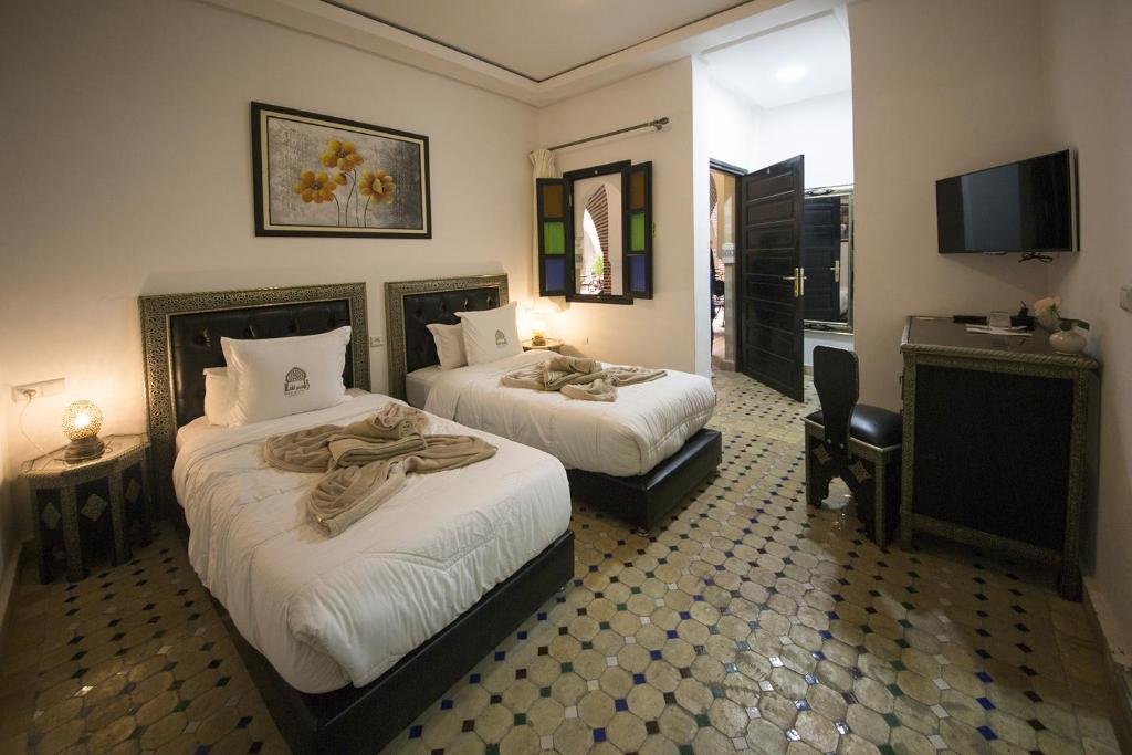 Riad Challa Hotel & Spa客房内的一张或多张床位