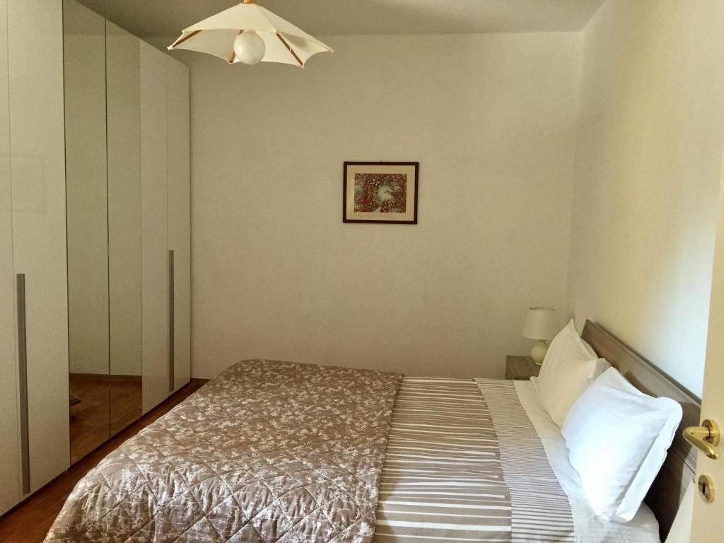 Appartamento Balù客房内的一张或多张床位
