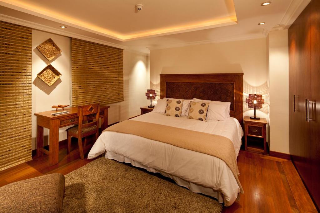 Ikala Quito Hotel客房内的一张或多张床位