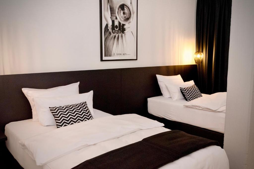 Hotel Merian客房内的一张或多张床位