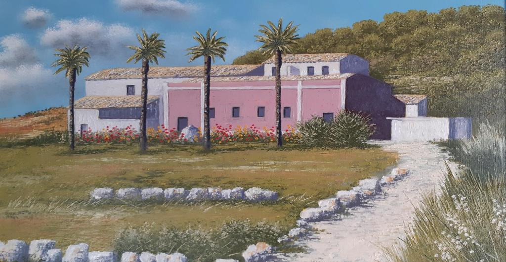 门菲里莱斯卡萨米拉比勒酒店的棕榈树粉红色房子的画