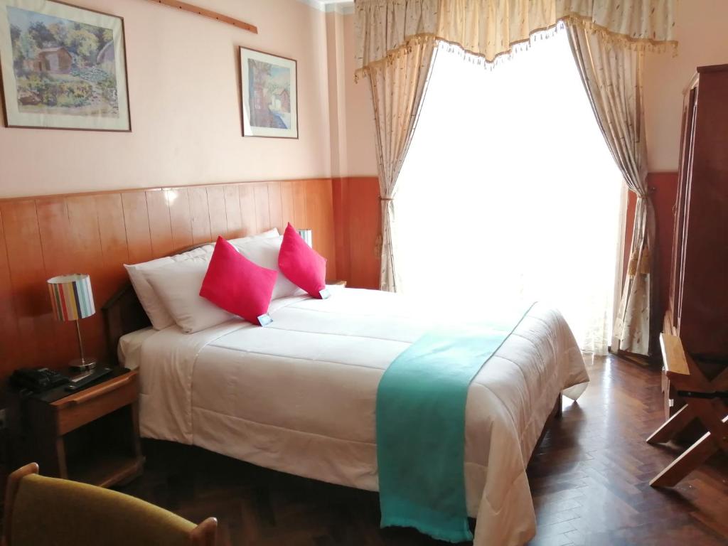 Huaytusive Inn Hotel客房内的一张或多张床位