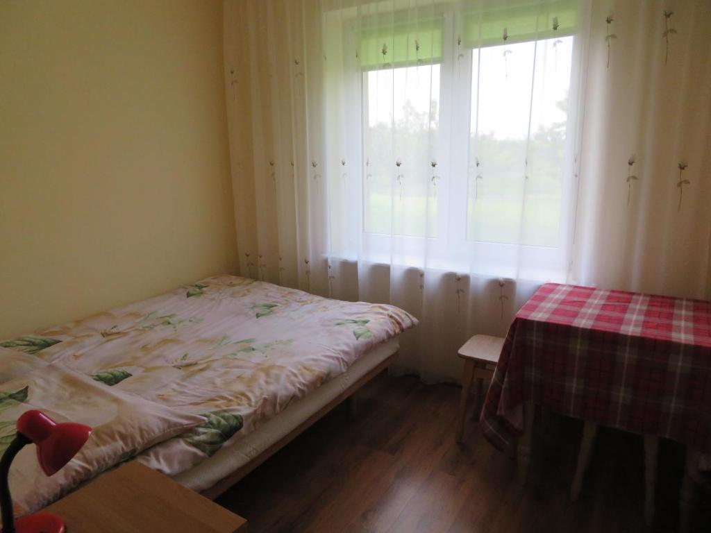 Agroturystyka Agnieszki Murszewskiej客房内的一张或多张床位