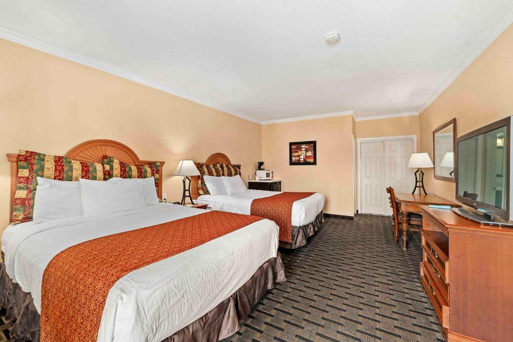 柠檬树酒店客房内的一张或多张床位