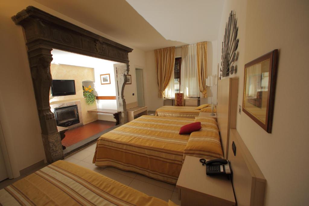 飞奥罗尼酒店客房内的一张或多张床位