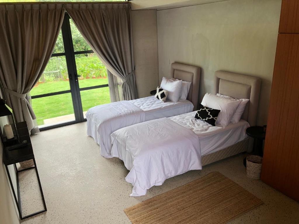 Laman Villa Port Dickson客房内的一张或多张床位