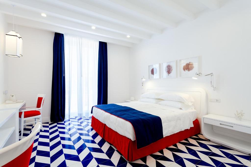 Maison Blu - Intimate GuestHouse客房内的一张或多张床位