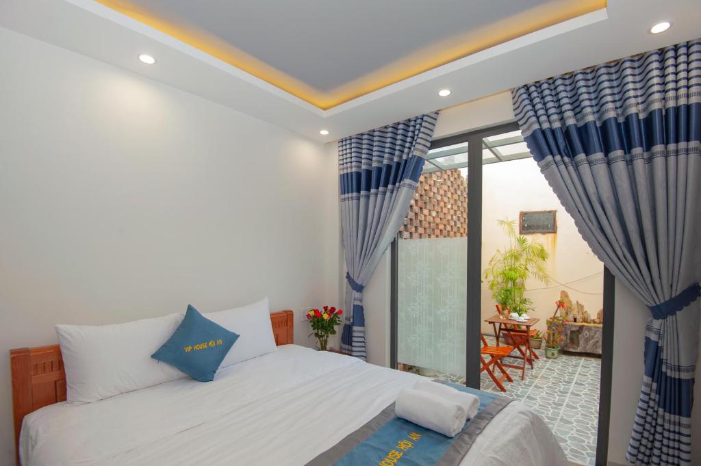 Vip House Hoi An Homestay客房内的一张或多张床位