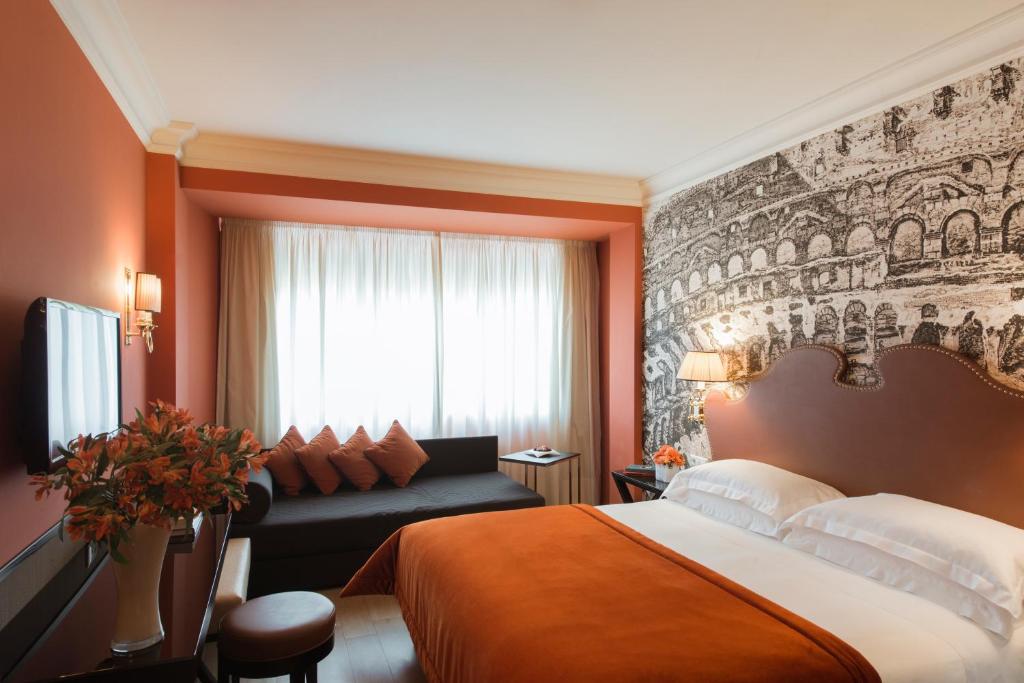 星际米开朗基罗罗姆酒店客房内的一张或多张床位