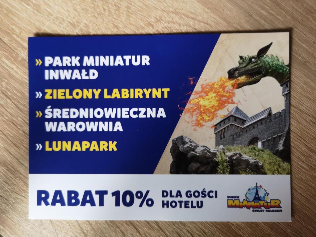安德雷胡夫兹洛卡丽贝卡酒店的一张卡片,上面有一只龙的照片