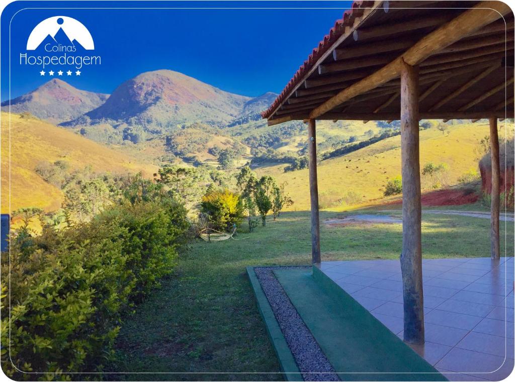 阿尤鲁奥卡Hospedagem Colinas的山房的背景照片