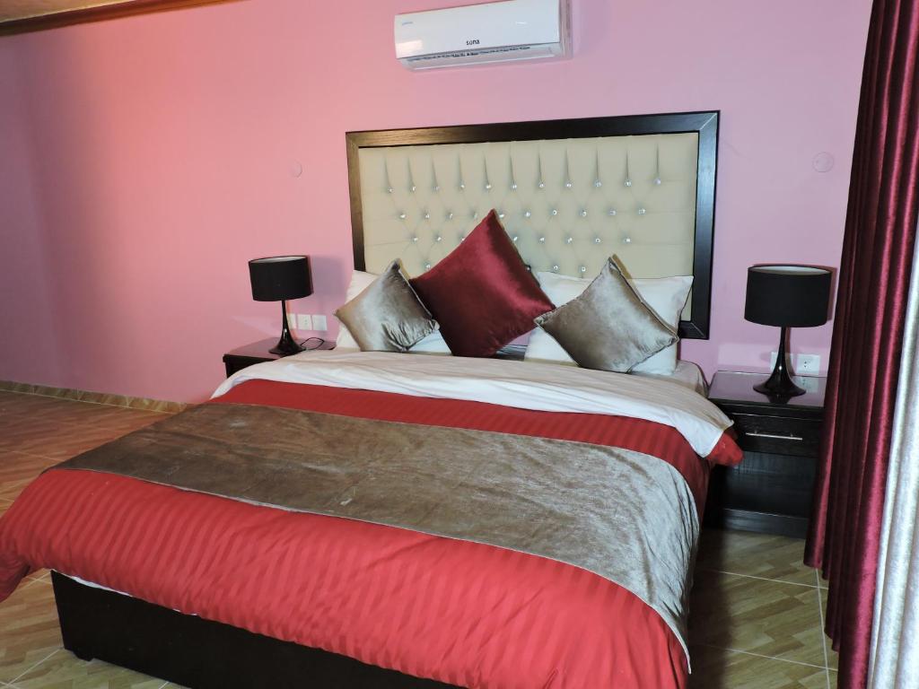 Valentine Inn Luxury客房内的一张或多张床位