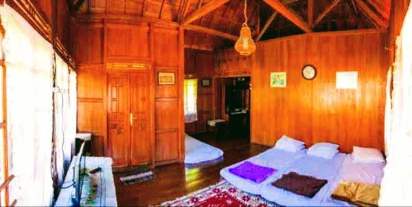 Oemah Kajoe Lembang客房内的一张或多张床位