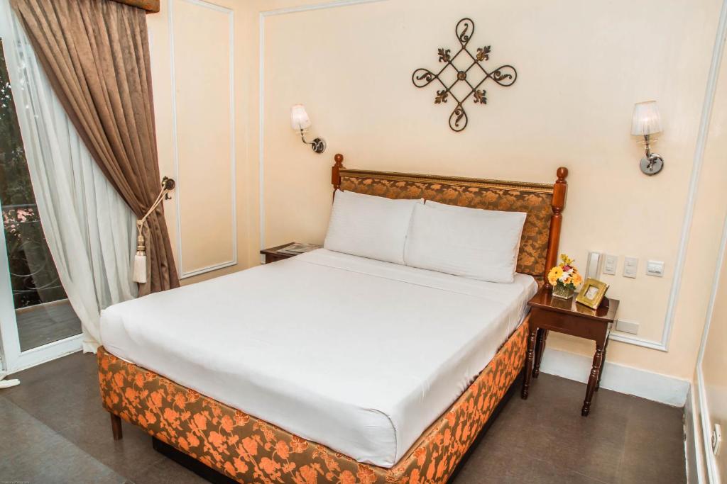 大雅台泰克宜景观花园酒店的酒店客房设有床和窗户。